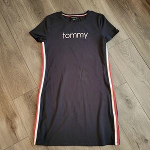 Tommy Hilfiger navy blue t-shirt dress. Red, white and blue straps on the side.